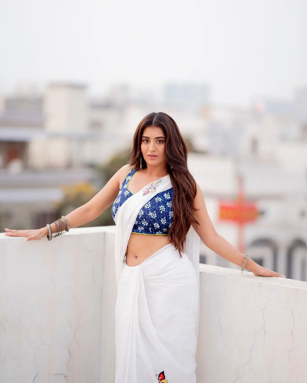 Rashi Singh in White Saree Blue Sleeveless Blouse